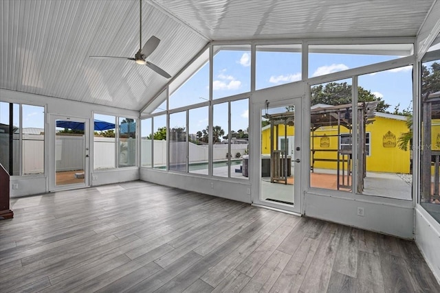 342 Euclid Ave, Daytona Beach, FL 32118 - unfurnished sunroom with vaulted ceiling, a ceiling fan, and plenty of natural light