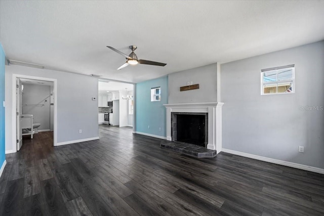 342 Euclid Ave, Daytona Beach, FL 32118 - unfurnished living room with a fireplace, ceiling fan, and dark wood finished floors
