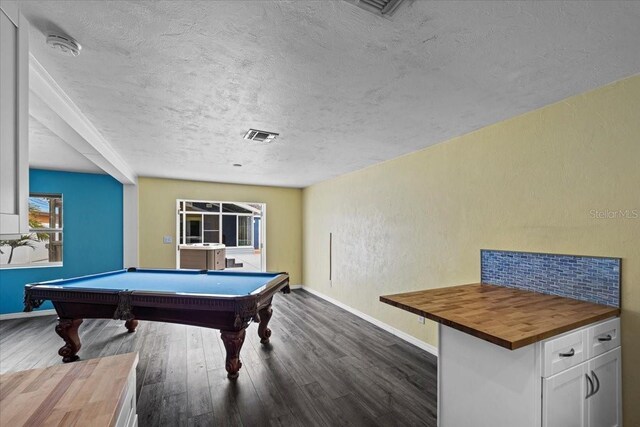 342 Euclid Ave, Daytona Beach, FL 32118 - recreation room featuring a textured ceiling, dark wood finished floors, and billiards table