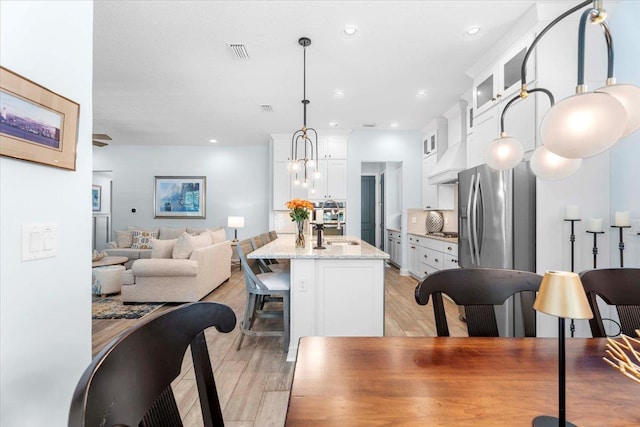97 Paranza Trce, Saint Augustine, FL 32095 - dining space with light wood finished floors and recessed lighting
