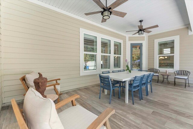 97 Paranza Trce, Saint Augustine, FL 32095 - wooden terrace with outdoor dining space and ceiling fan