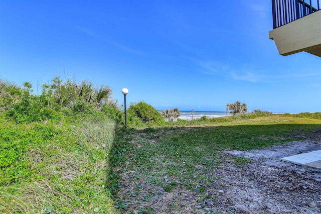 8550 S A1A # 102, Saint Augustine, FL 32080 - view of yard featuring a water view, a balcony, and a beach view