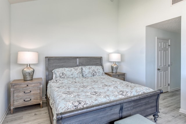 8550 S A1A # 102, Saint Augustine, FL 32080 - bedroom with wood finished floors, baseboards, and visible vents