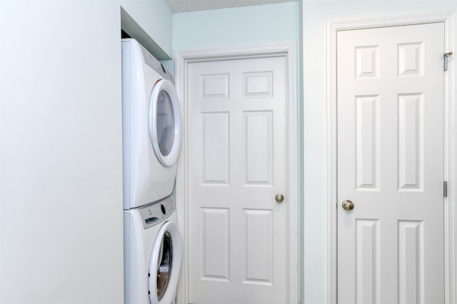 8550 S A1A # 102, Saint Augustine, FL 32080 - washroom with stacked washer / drying machine and laundry area