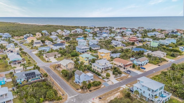 aerial view with a water view and a residential view