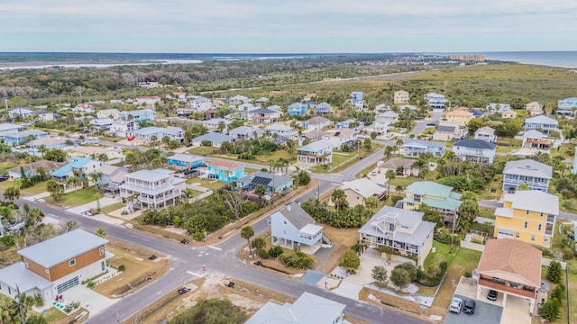 aerial view with a residential view and a water view