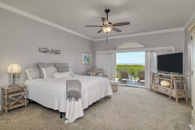 carpeted bedroom featuring french doors, access to outside, ornamental molding, ceiling fan, and a textured ceiling