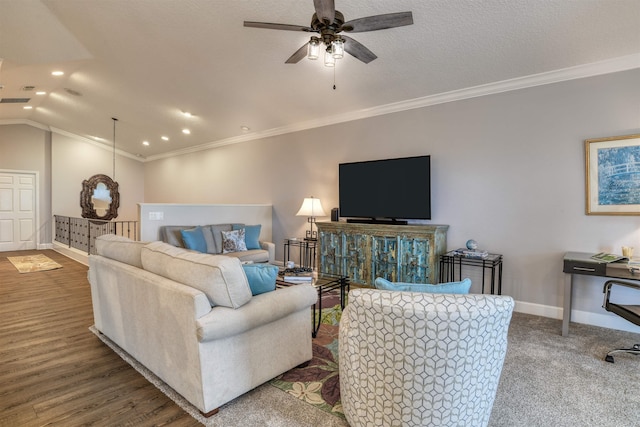 living room featuring a textured ceiling, lofted ceiling, crown molding, and ceiling fan