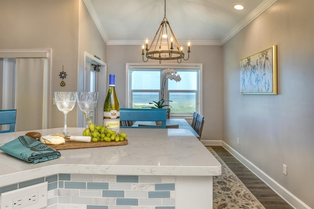 616 Mediterranean Way, Saint Augustine, FL 32080 - dining space featuring a chandelier, dark wood finished floors, crown molding, and recessed lighting