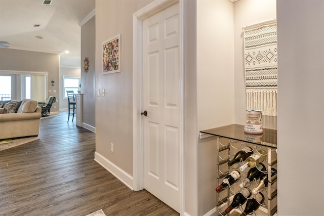 616 Mediterranean Way, Saint Augustine, FL 32080 - corridor featuring ornamental molding and wood finished floors