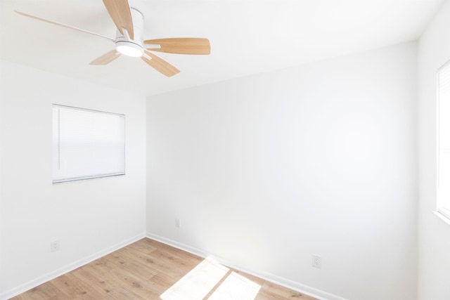 unfurnished room with ceiling fan and light hardwood / wood-style flooring