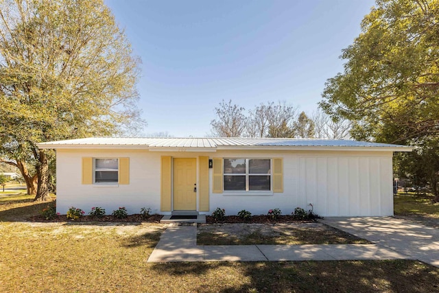202 Deltona Blvd, Saint Augustine, FL 32086 - ranch-style house featuring metal roof and concrete block siding