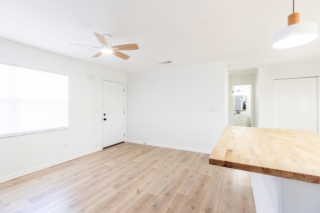202 Deltona Blvd, Saint Augustine, FL 32086 - spare room featuring light wood-style floors, ceiling fan, and baseboards