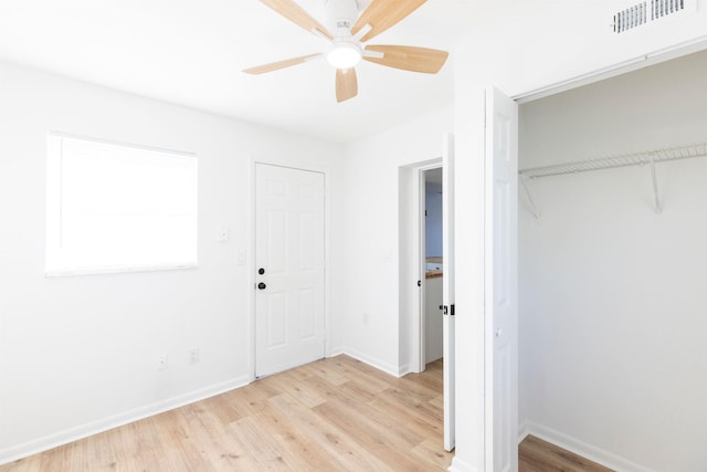 202 Deltona Blvd, Saint Augustine, FL 32086 - unfurnished bedroom featuring light wood-style floors, a closet, baseboards, and ceiling fan