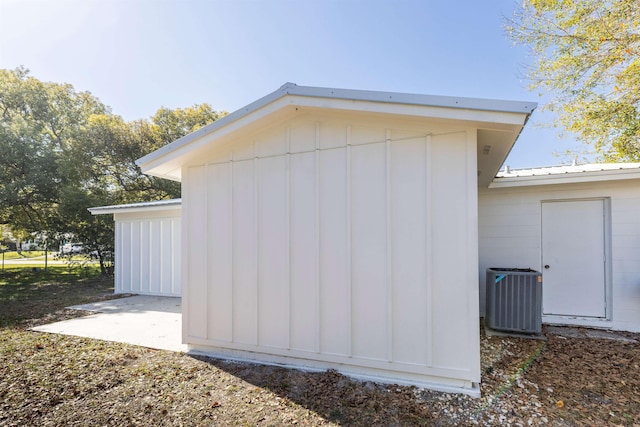 view of side of property with central AC