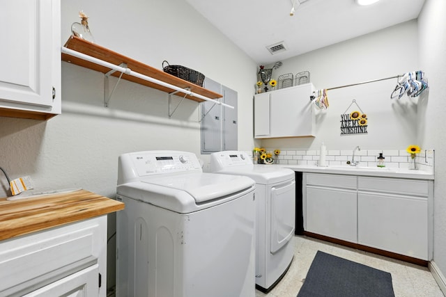133 Federal Point Rd, East Palatka, FL 32131 - washroom featuring a sink, cabinet space, independent washer and dryer, and visible vents