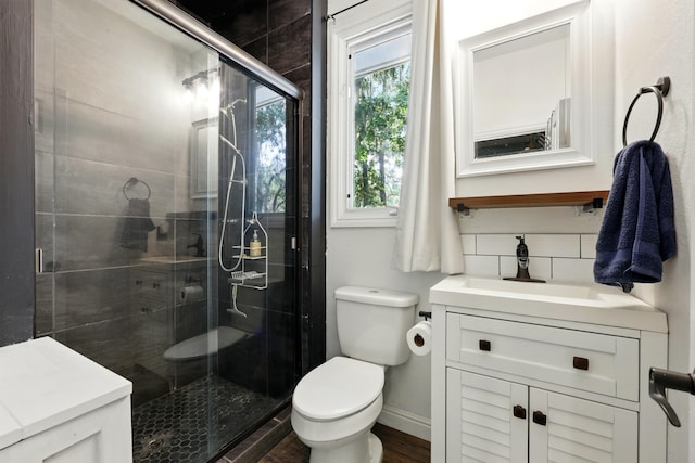 133 Federal Point Rd, East Palatka, FL 32131 - full bath featuring vanity, toilet, baseboards, and a stall shower