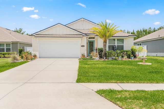 ranch-style house with a front yard and a garage