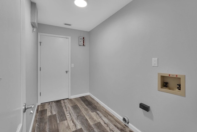 61 Brownstone Ln, Palm Coast, FL 32137 - laundry area featuring hookup for a washing machine and wood finished floors