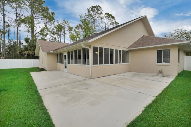61 Brownstone Ln, Palm Coast, FL 32137 - back of property featuring stucco siding, a shingled roof, a patio area, and a sunroom