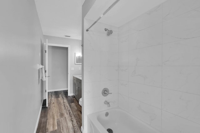 61 Brownstone Ln, Palm Coast, FL 32137 - bathroom with vanity, tub / shower combination, and wood finished floors