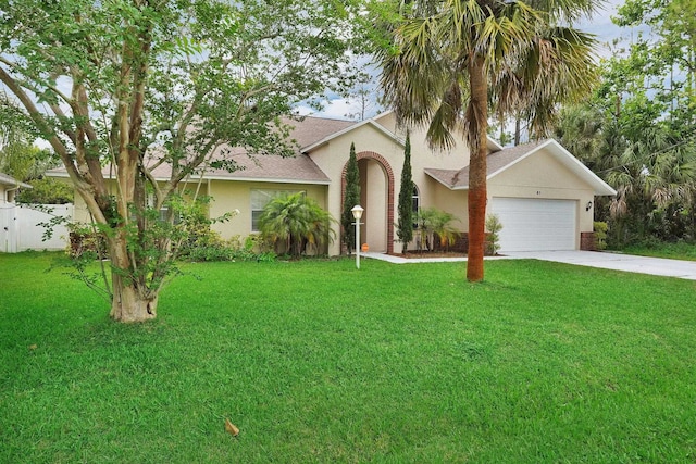 61 Brownstone Ln, Palm Coast, FL 32137 - view of front of house with an attached garage, roof with shingles, driveway, and stucco siding