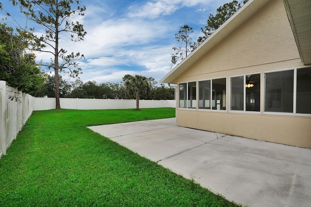 61 Brownstone Ln, Palm Coast, FL 32137 - fenced backyard featuring a patio