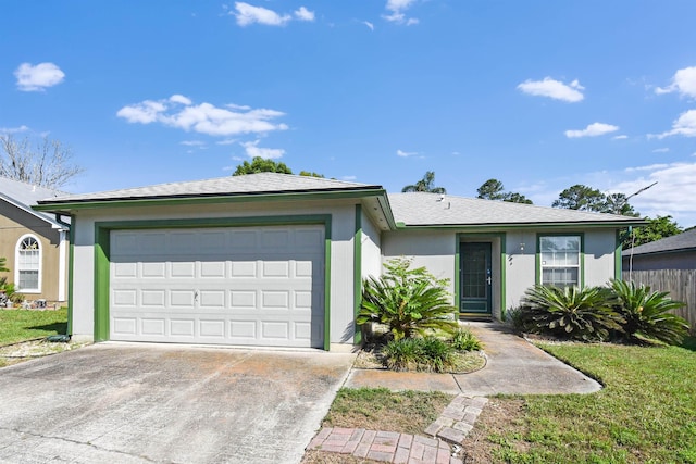 726 Calico Jack Way, Green Cove Springs, FL 32043 - ranch-style home with an attached garage, driveway, stucco siding, and fence