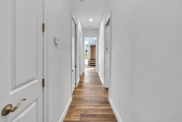 hall featuring dark hardwood / wood-style flooring