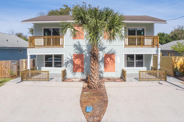 112 2nd St, Saint Augustine, FL 32080 - view of front of house with a balcony
