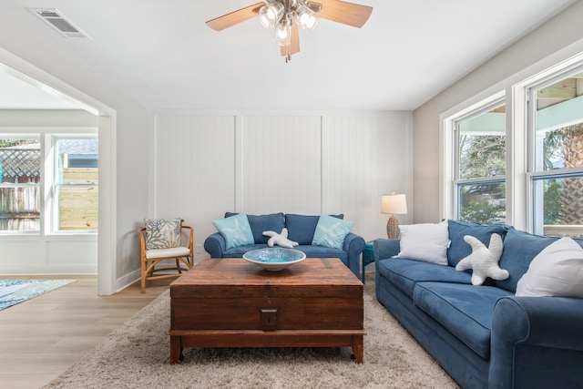 112 2nd St, Saint Augustine, FL 32080 - living area featuring a ceiling fan, light wood-type flooring, and baseboards