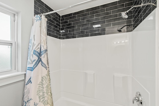 112 2nd St, Saint Augustine, FL 32080 - full bathroom with plenty of natural light and shower / bath combination with curtain