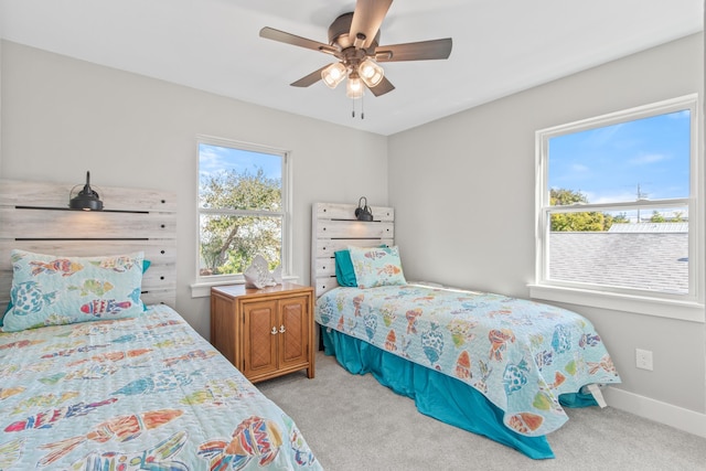112 2nd St, Saint Augustine, FL 32080 - carpeted bedroom with a ceiling fan and baseboards
