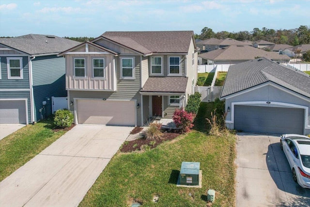 view of front of house with board and batten siding, fence, a residential view, concrete driveway, and roof with shingles