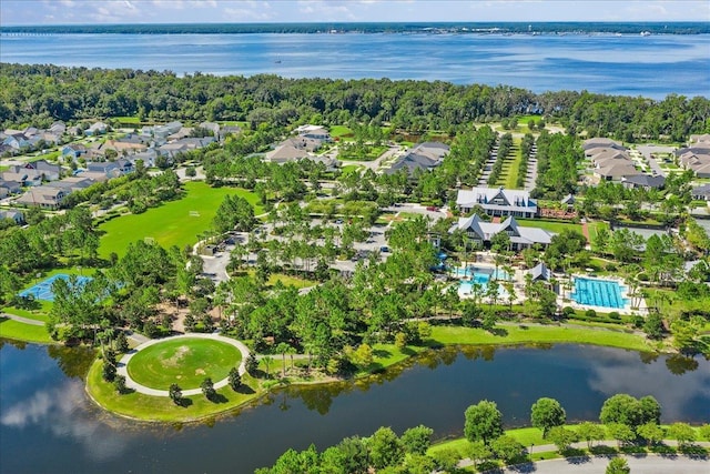 birds eye view of property with a water view