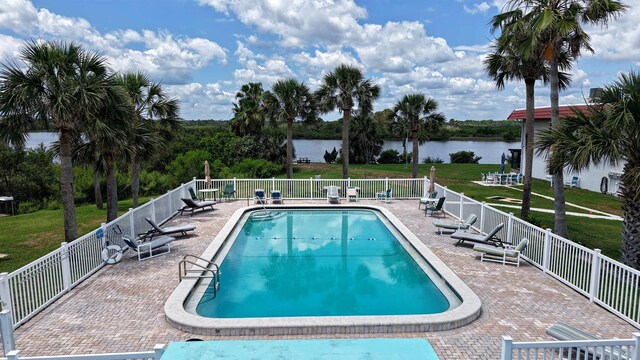 5 N Ocean Palm Villas Unit 5, Flagler Beach, FL 32136 - community pool with a water view and a patio