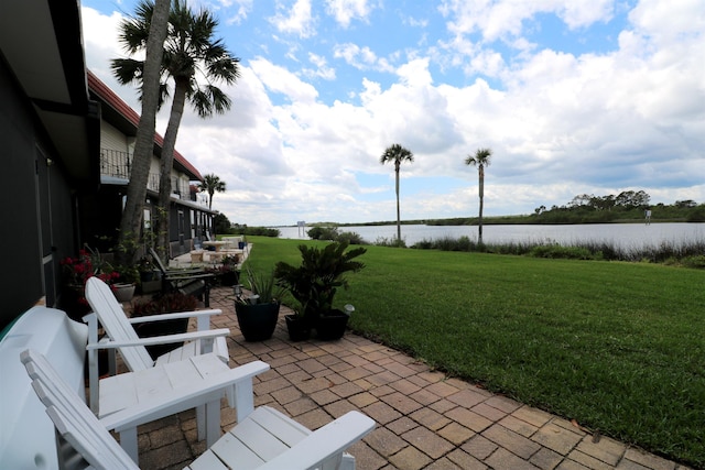 5 N Ocean Palm Villas Unit 5, Flagler Beach, FL 32136 - view of patio / terrace with a water view