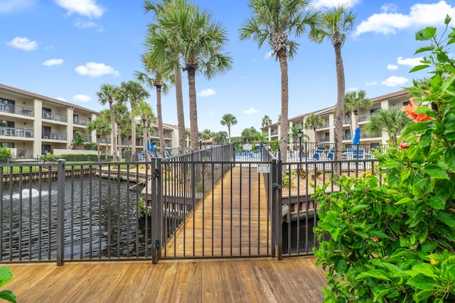 view of gate with a water view