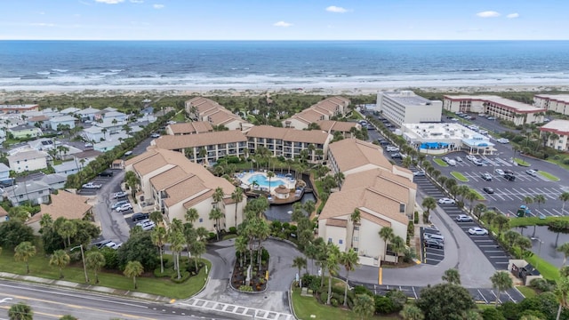 bird's eye view featuring a beach view and a water view