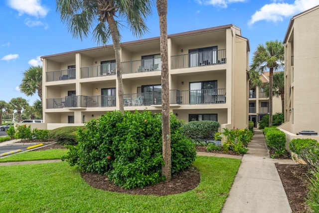 850 A1A Beach Blvd Unit 3, Saint Augustine Beach, FL 32080 - view of apartment building / complex with uncovered parking