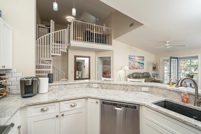 kitchen featuring white cabinetry, sink, and dishwasher