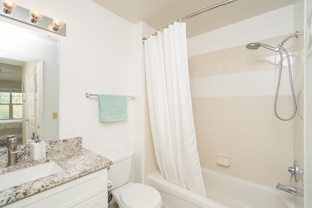 full bathroom featuring vanity, toilet, and shower / bath combo with shower curtain