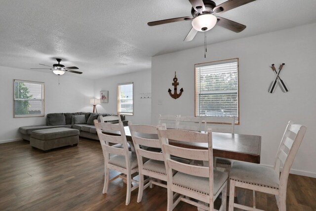 237 Riberia St, Saint Augustine, FL 32084 - dining area with baseboards, a ceiling fan, dark wood-style floors, and a textured ceiling