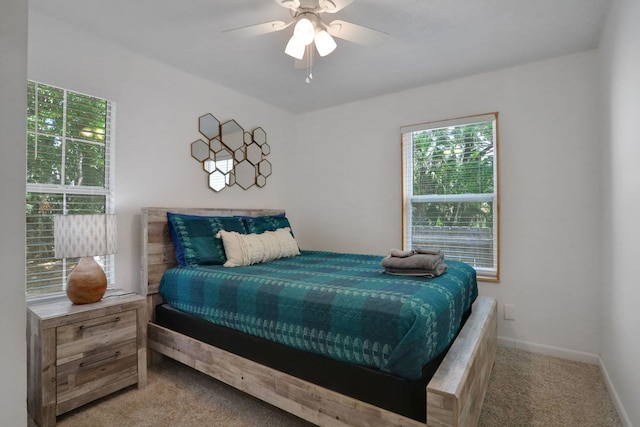 237 Riberia St, Saint Augustine, FL 32084 - carpeted bedroom with baseboards and ceiling fan