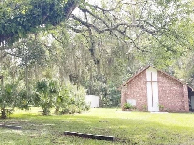 303 E Carter St, Hastings, FL 32145 - view of green lawn