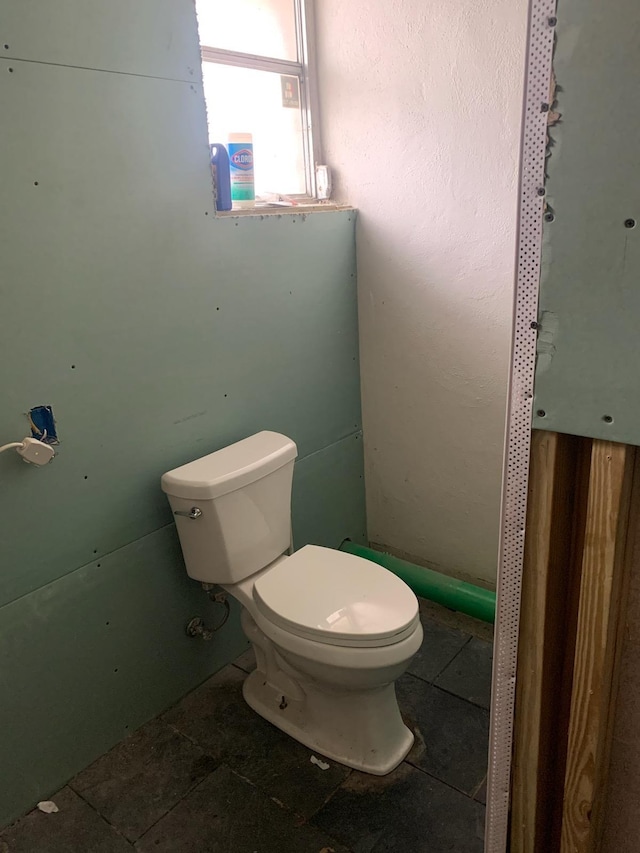 303 E Carter St, Hastings, FL 32145 - bathroom featuring toilet and tile patterned flooring