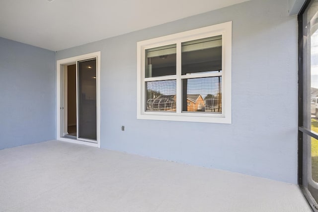 unfurnished sunroom featuring plenty of natural light