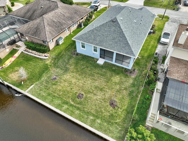 drone / aerial view featuring a water view