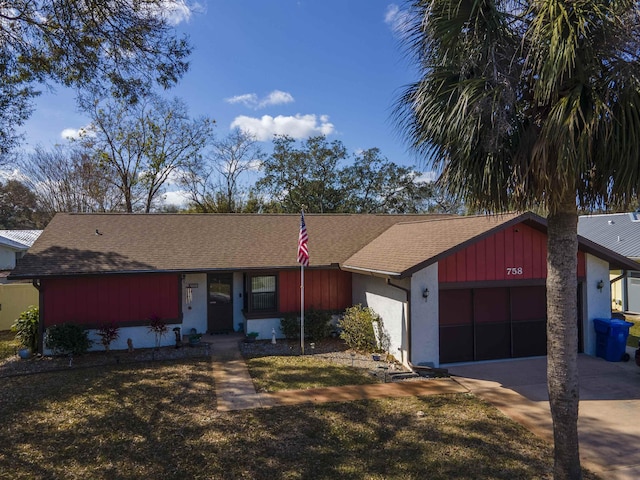 ranch-style house featuring a garage