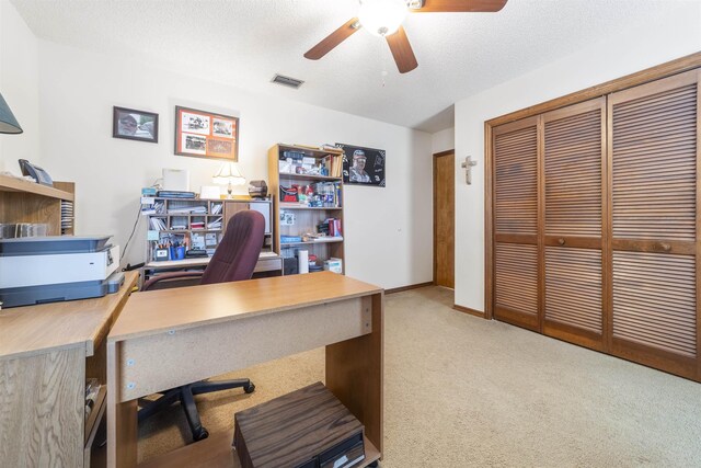 garage featuring heating unit, water heater, and a garage door opener